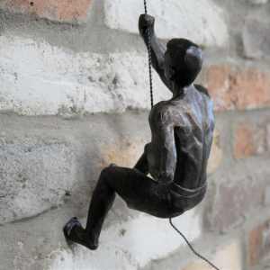 Antiqued Black & Gold Abseiling Man in shorts